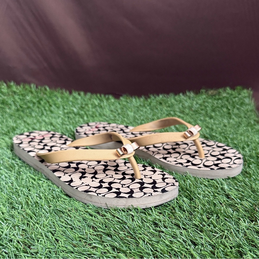 Coach Black and Cream Signature Pattern Sandals with Metal Bow Accent